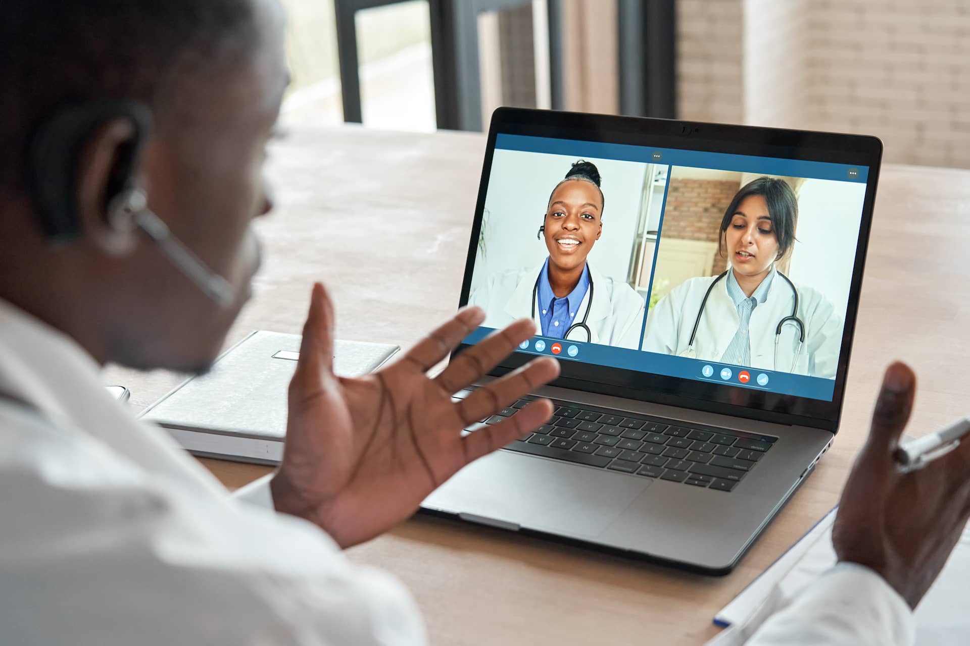salesman on video call with healthcare provider